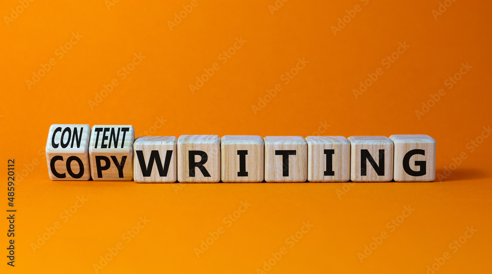 Content writing or copywriting symbol. Turned cubes and changed concept words content writing to copywriting. Beautiful orange background copy space. Business Content writing or copywriting concept.